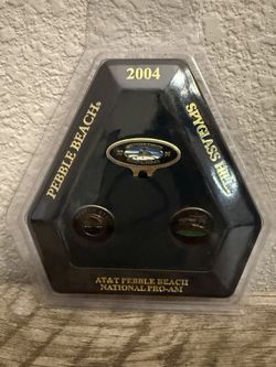 New Commemorative 2004 AT&T Pebble Beach National Pro-Am golf collectible set, featuring a hat clip and ball markers Price is firm