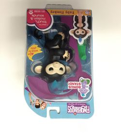 Black fingerling baby monkey