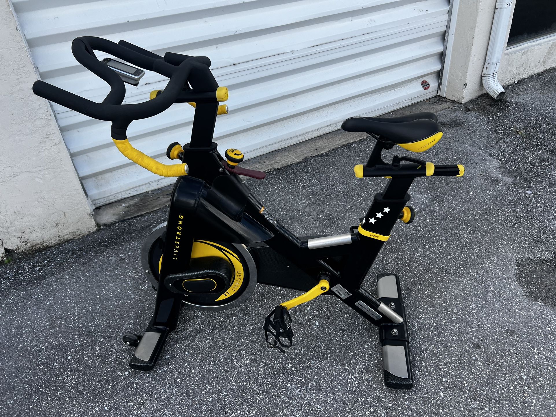 Livestrong Drop Down Handlebar Indoor Cycling Bike Stationary Bike for Home Gym Exercise and Cardio Fitness! Works great! This is the top model and Re