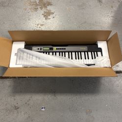 Casio Casiotone LK-S245 Keyboard with 61 Key Includes Stand, Power Cord & Pedal