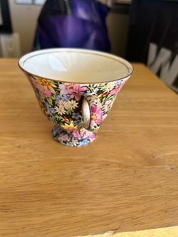 Antique floral cup