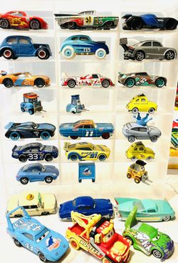 collection of die-cast toy cars from the Disney and Pixar Cars franchise. These vehicles are highly detailed, 1:55 scale models designed to replicate 