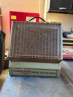 “Vintage Winchester Trailblazer PH-2700, 7,000-BTU catalytic heater. Untested; missing propane hose/control assembly. Rust and wear as pictured. Sold