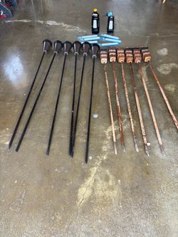 Tiki outdoor torches with extra torch wicks and steaks and torch fuels