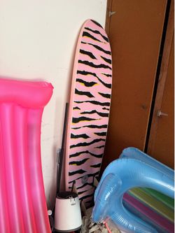 Catch Surf Odysea JOB Pro surfboard features a striking pink and black zebra-striped design.l