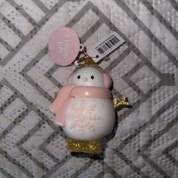 Light up snowman hand sanitizer holder