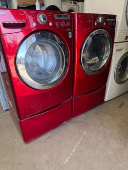 LG cherry red front load set with pedestal