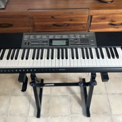 Casio Electric Keyboard With Adjustable Stand
