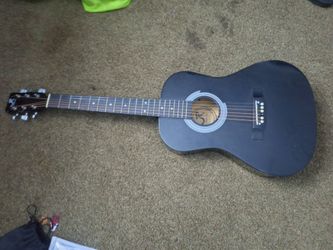 J. Reynolds guitar- extra replacing strings and 4 picks in a black bag