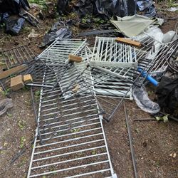 Approximately 65 ft of Regalo Super Wide Adjustable Baby Gate and Play Yard, Black, very used