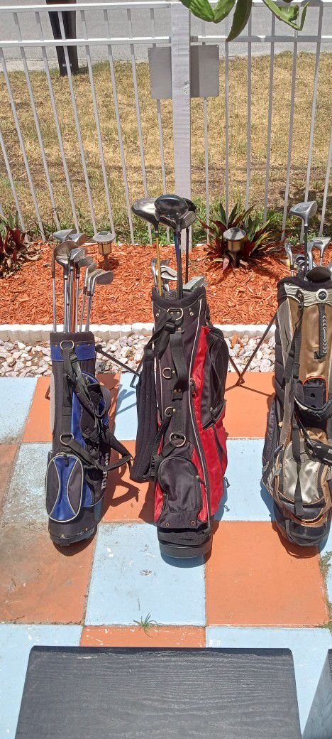 3 Golf Bags Of Professional Golf Clubs.