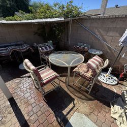 Patio Furniture Round Table With Four Chairs And The Cover