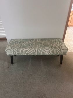 Cream and green bench