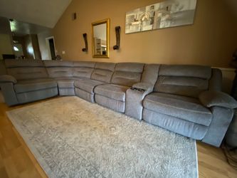 Sectional recliner with charger and cup holders - Pickup