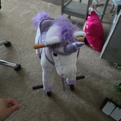 Girl Riding Pony Toy