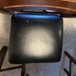 Table With Four Chairs In Good Conditions 