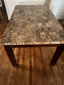 Bob’s furniture Marble Veneer dining table and Armoire cabinet with vine holder