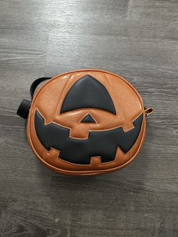 Orange Cyclops Love Pain & Stitches Leather Pumpkin Bag.
