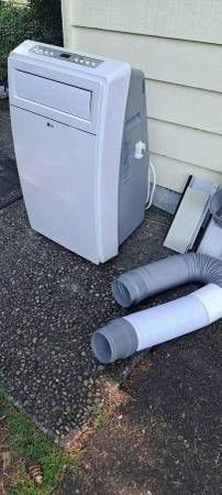 LG 12K BTU Portable A/C Unit with hoses delivery Available -