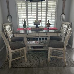 Counter height, dining table with six chairs