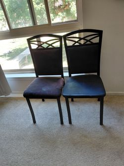 4 Black Metal dining room chairs $30 per chair