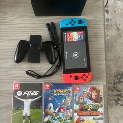 Nintendo Switch with memory card and games