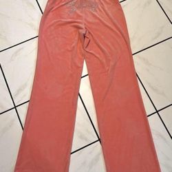 Juicy Couture velour flare pants in the color "Strawberry Ice” 