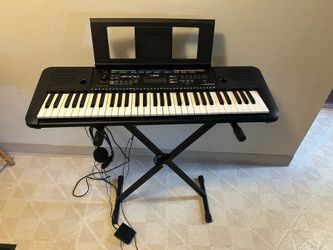 Yamaha E-253 Keyboard w/Music and Keyboard stands, headphones and sustain pedal.  All works great, no damage or problems with any of it. Has many diff