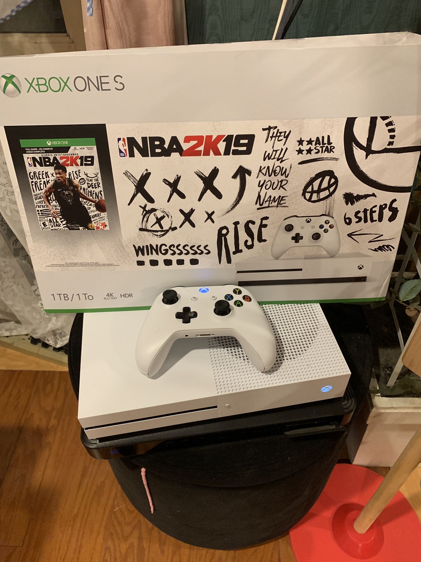 Xbox one s. 1 TB. With controller and nba 2k19 and hdmi. Asking $180 obo