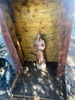 Wooden box with statue