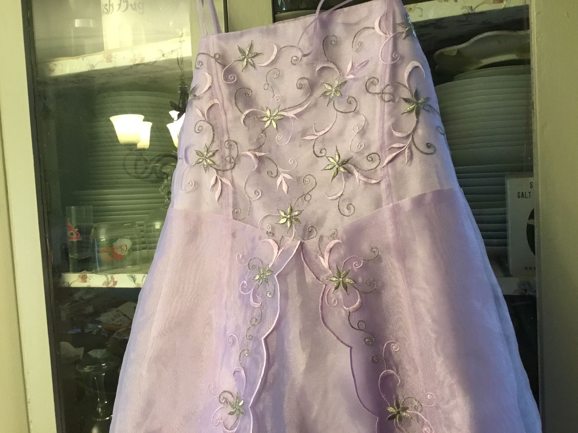 Girls size 14 Easter dresses 9$ each one lilac and one ivory