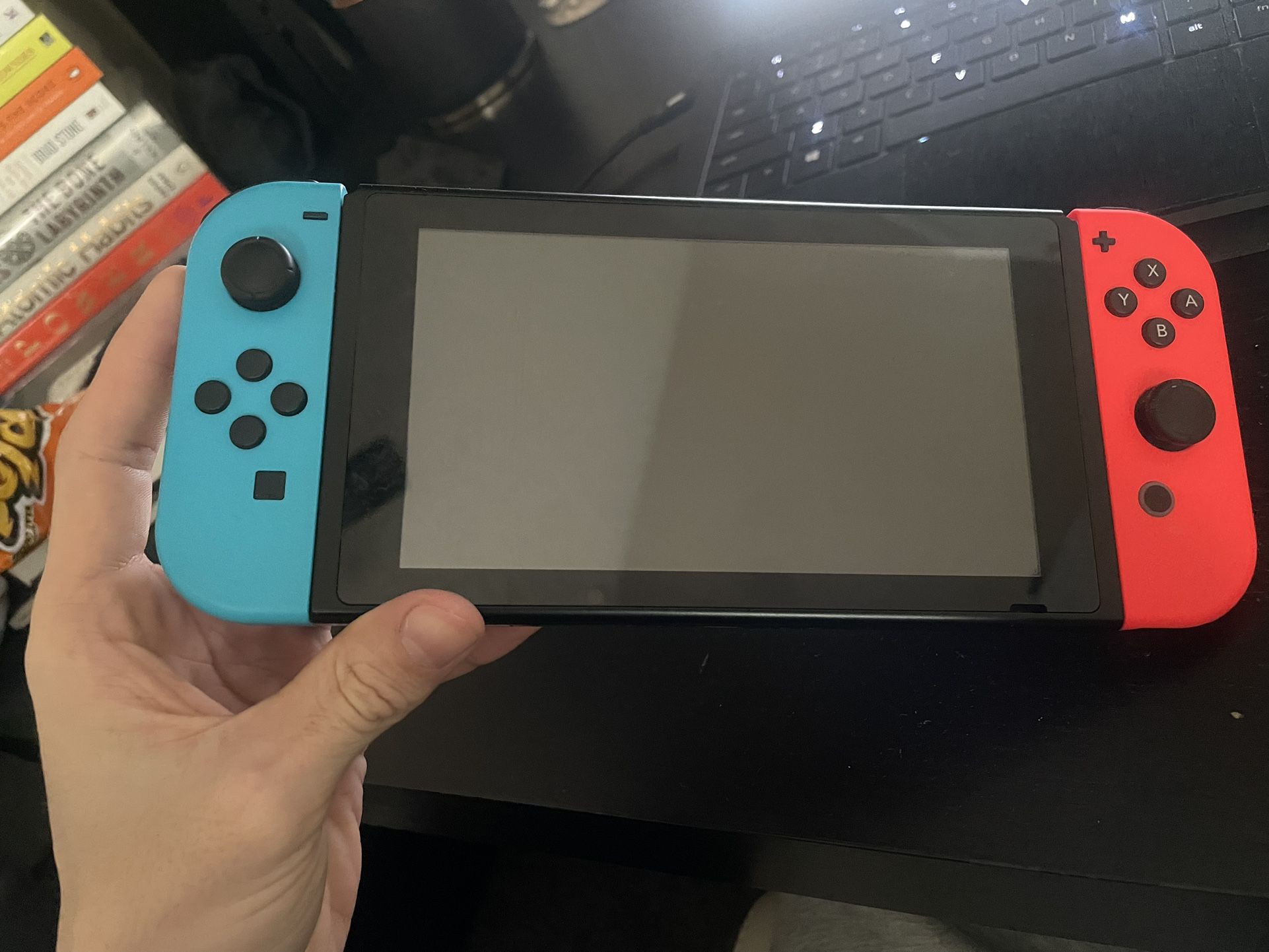 Nintendo Switch + 8 Games