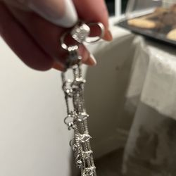 silver chain bracelet.