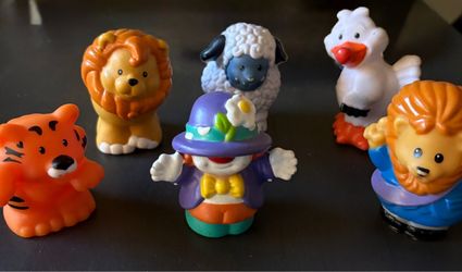 Smiley the Clown, a plastic figurine from the Fisher-Price Little People circus and carnival sets released around 2001
