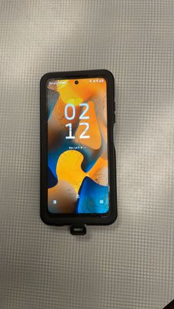 Moto G 25 w/ protective case