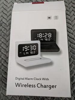 Wireless phone charger/clock