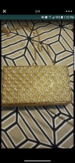 Gold metal chic clutch New with tags