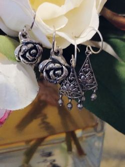 Two pairs of Handmade Artisan Design earrings.