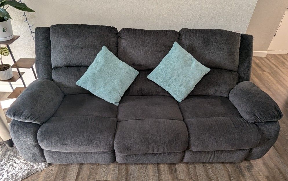 Modern Reclining Sofa By Ashley