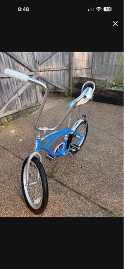 Blue Schwinn Stingray Banana Seat Bike