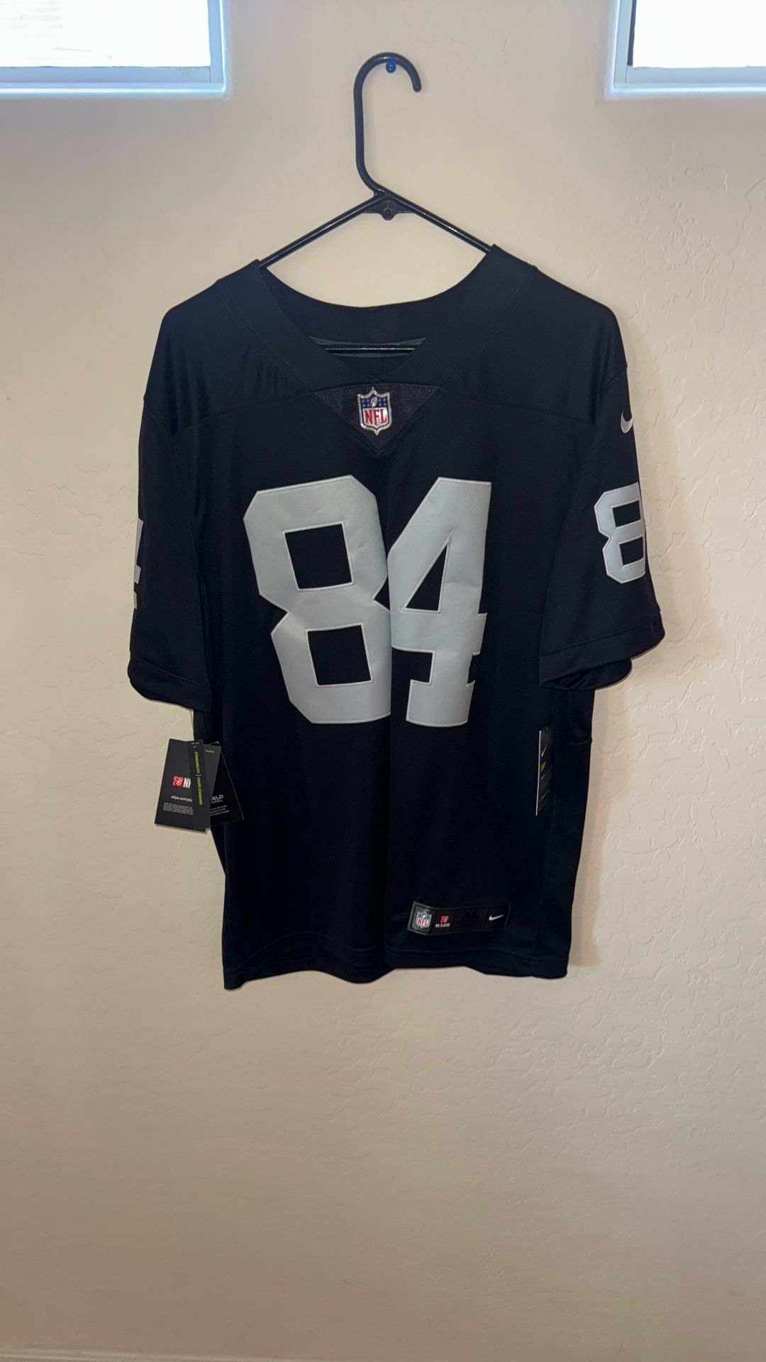 raiders football jersey brown large size