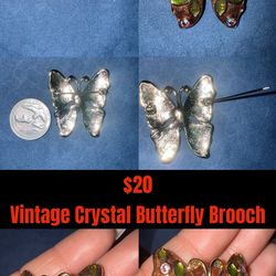 $100-6 brooches