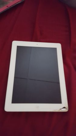 White Apple IPad w/ minor cracks.