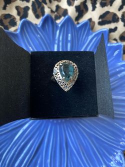 Filigree pear cut blue topaz silver ring