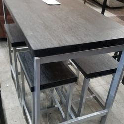 Black And Silver Counter Height Table With 4 stools 