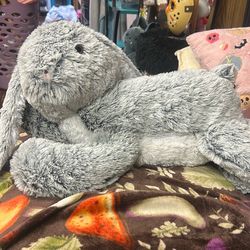 Stuffed animal bunny with three babies that get stored in her stomach
