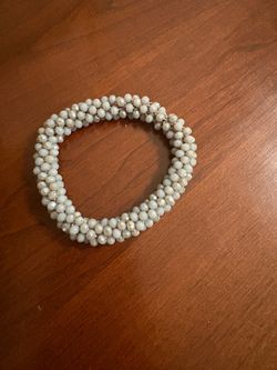 White glass beaded cluster stretch bracelet created with all white facet cut color beads