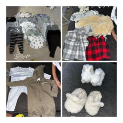 Lot Of Baby Clothes And Baby Stuff And Bassinet And Diapers