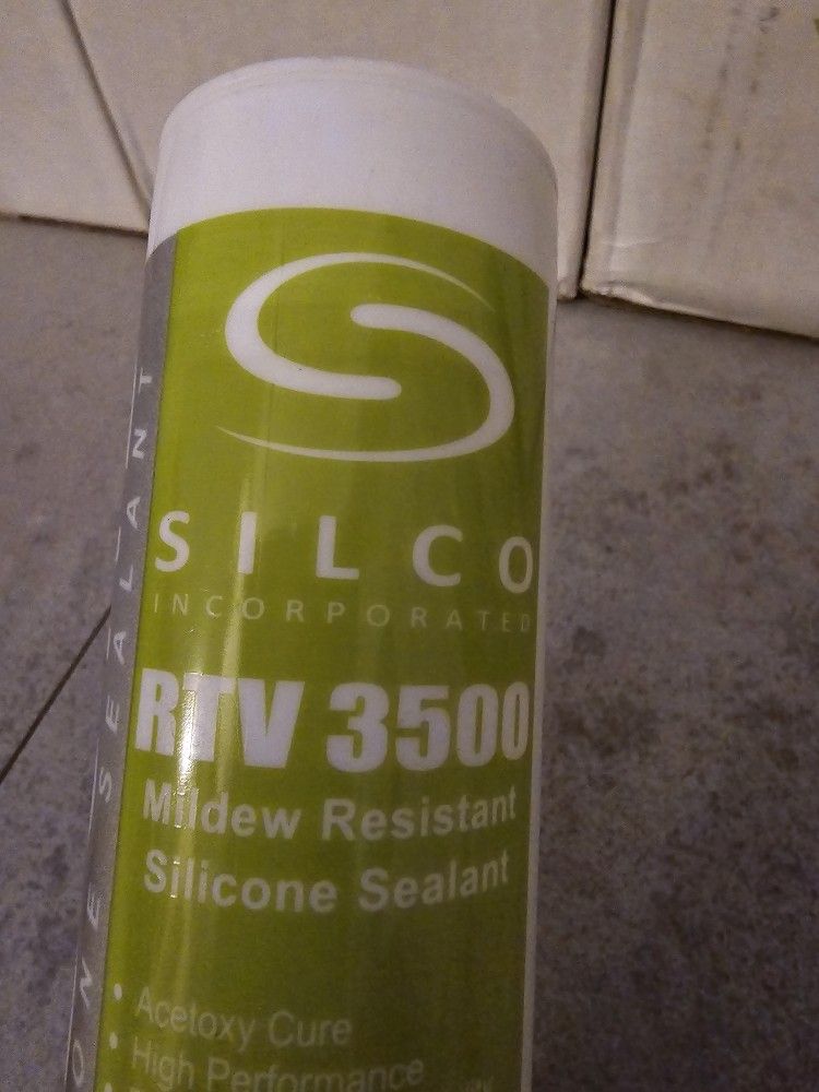 Silicone sealant -Brand new! Gray Color