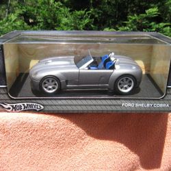 Hot Wheels Metal Collectibles Ford Shelby Cobra Silver Die Cast 1:18

Scale NOS